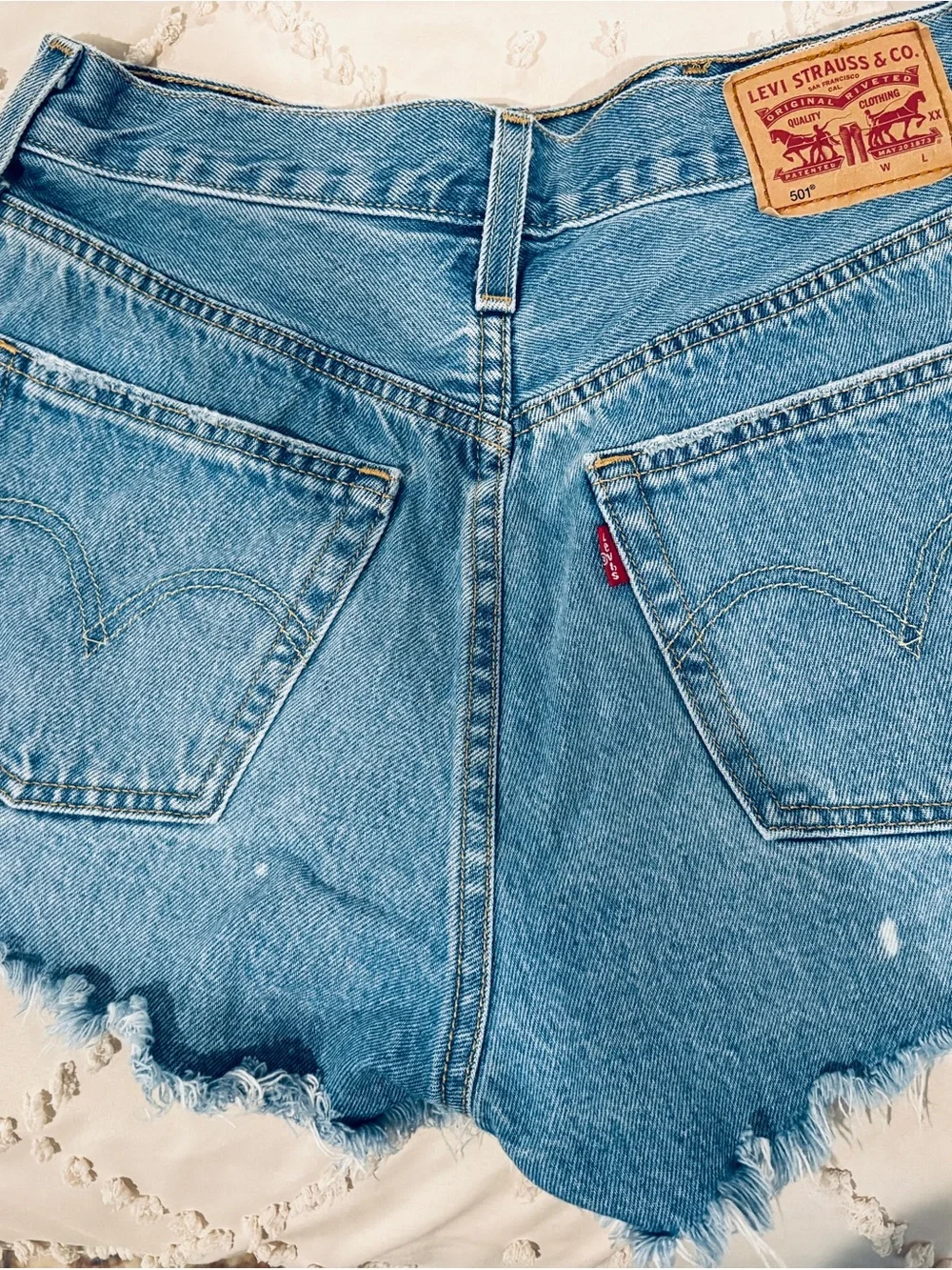 Levi's Distressed Light Blue Denim Cutoff Shorts